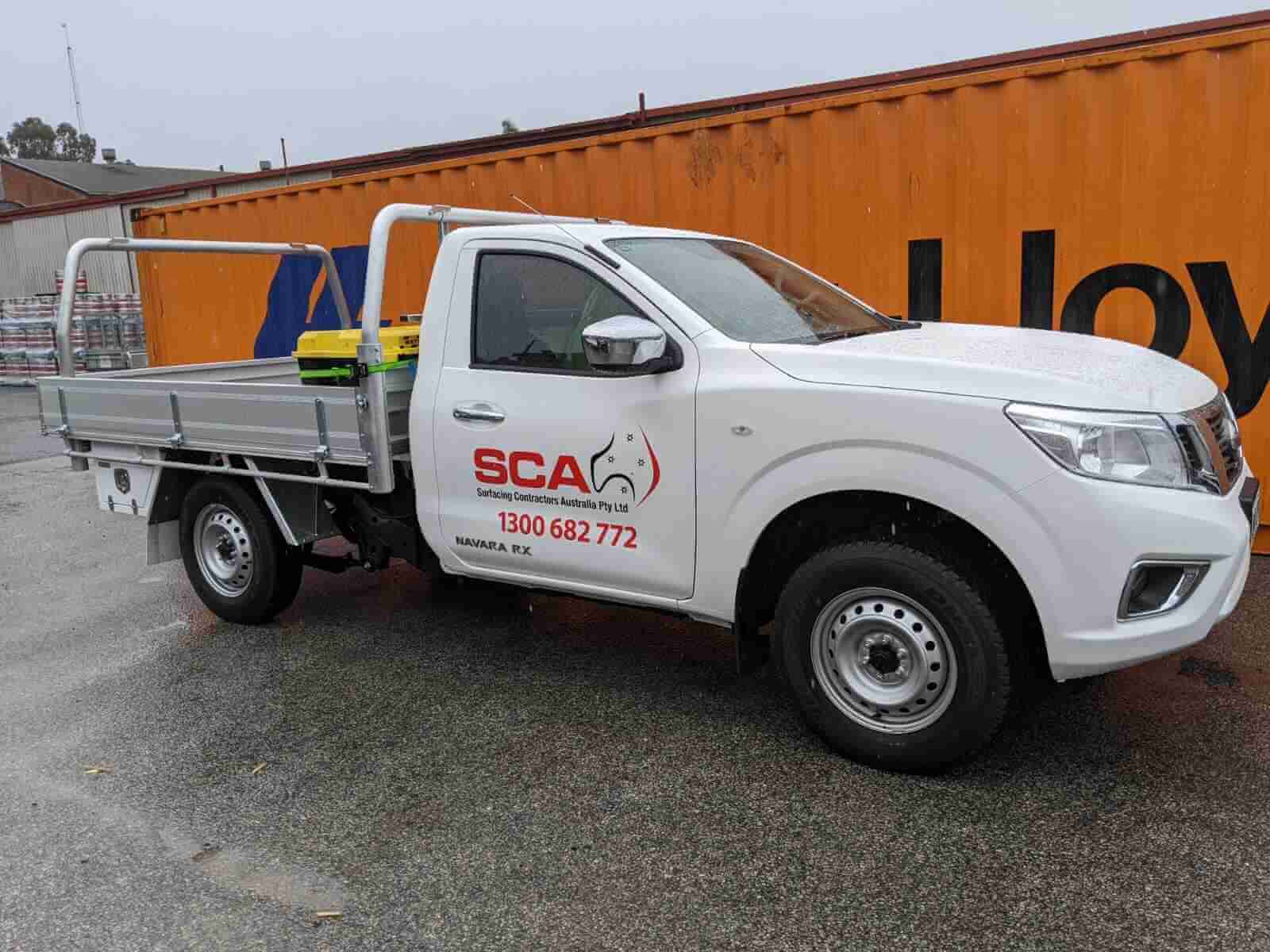 White utility vehicle with SCA branding
