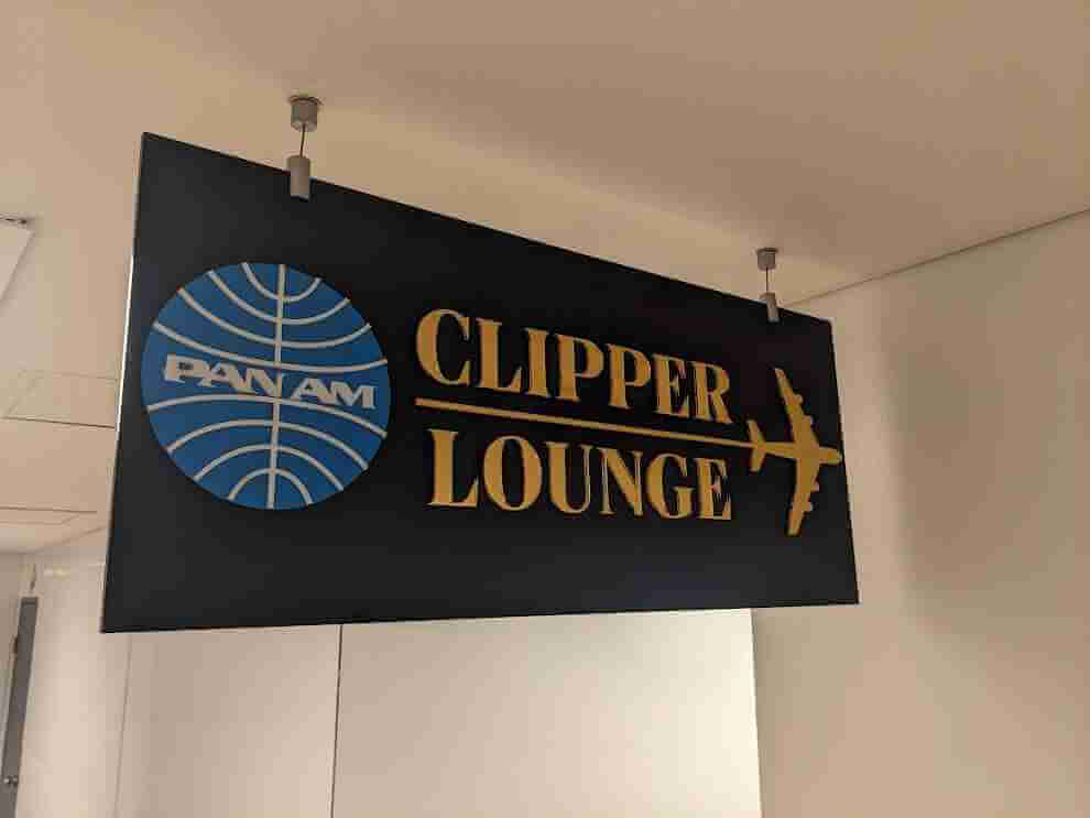 Clipper Lounge suspended indoor sign with branded logo and graphics