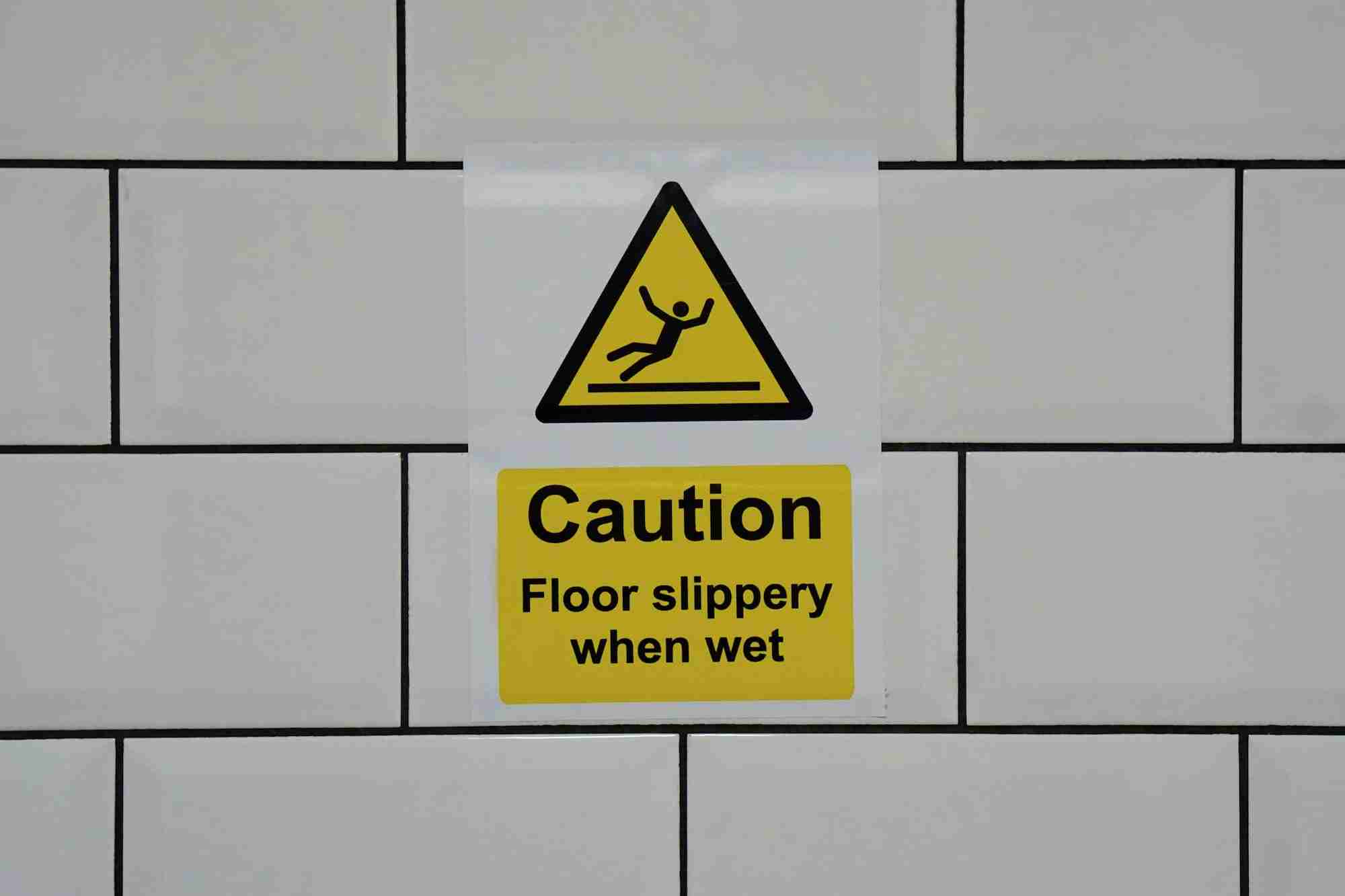 Wet floor caution safety sign.