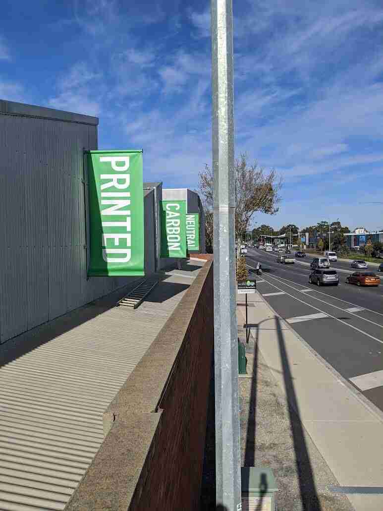 Banners promoting printed carbon neutrality
