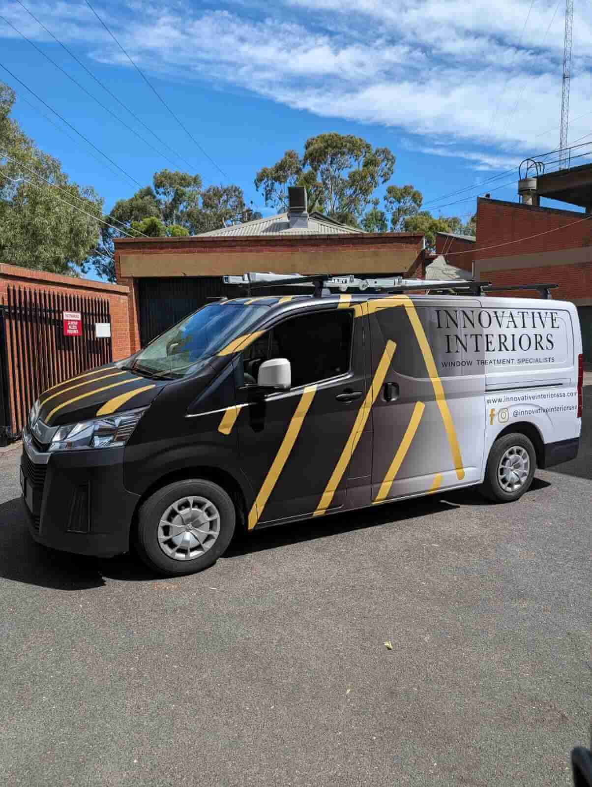 Van with Innovative Interiors branding.