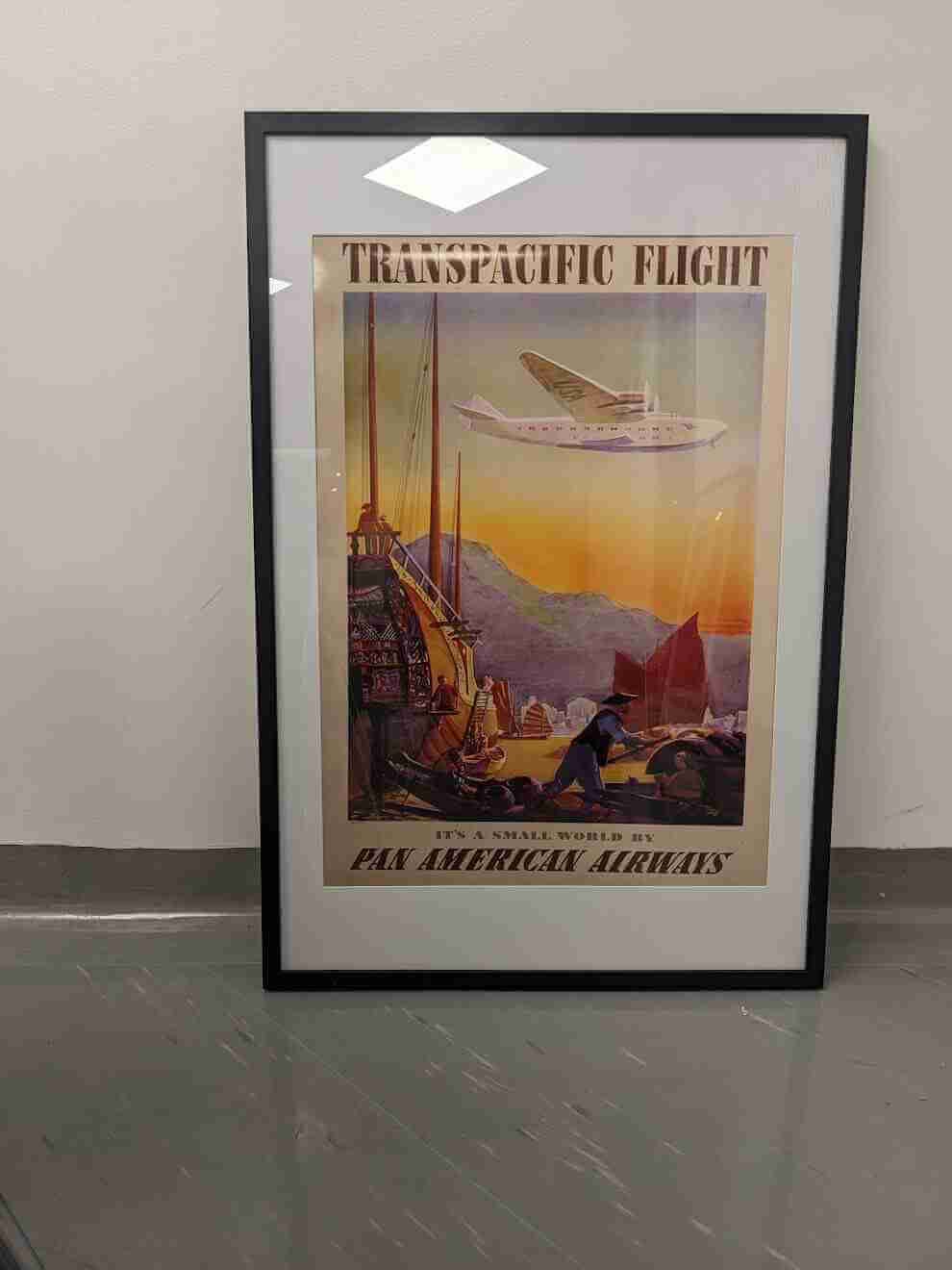 Framed aviation poster showcasing large-format print signage