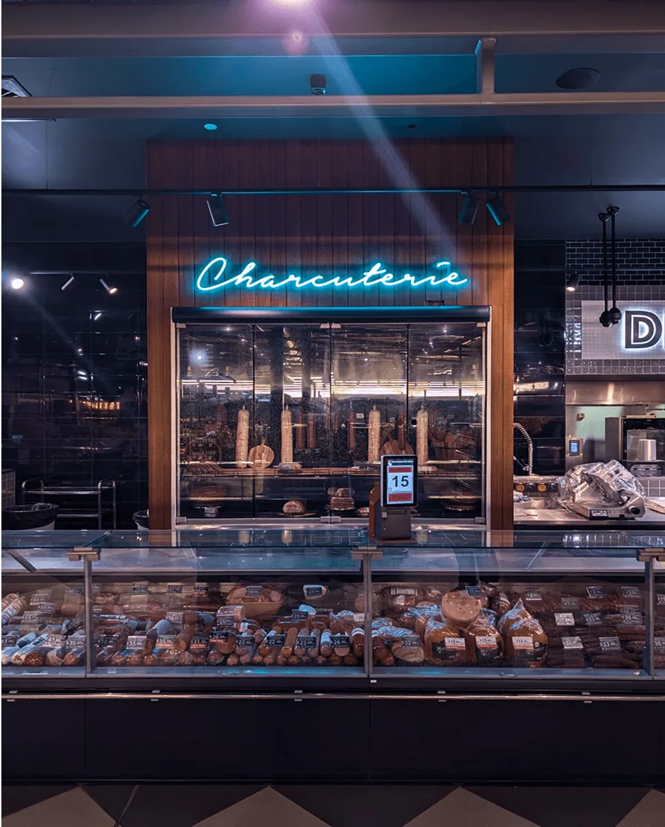 Restaurant exterior with bright blue neon illuminated signage