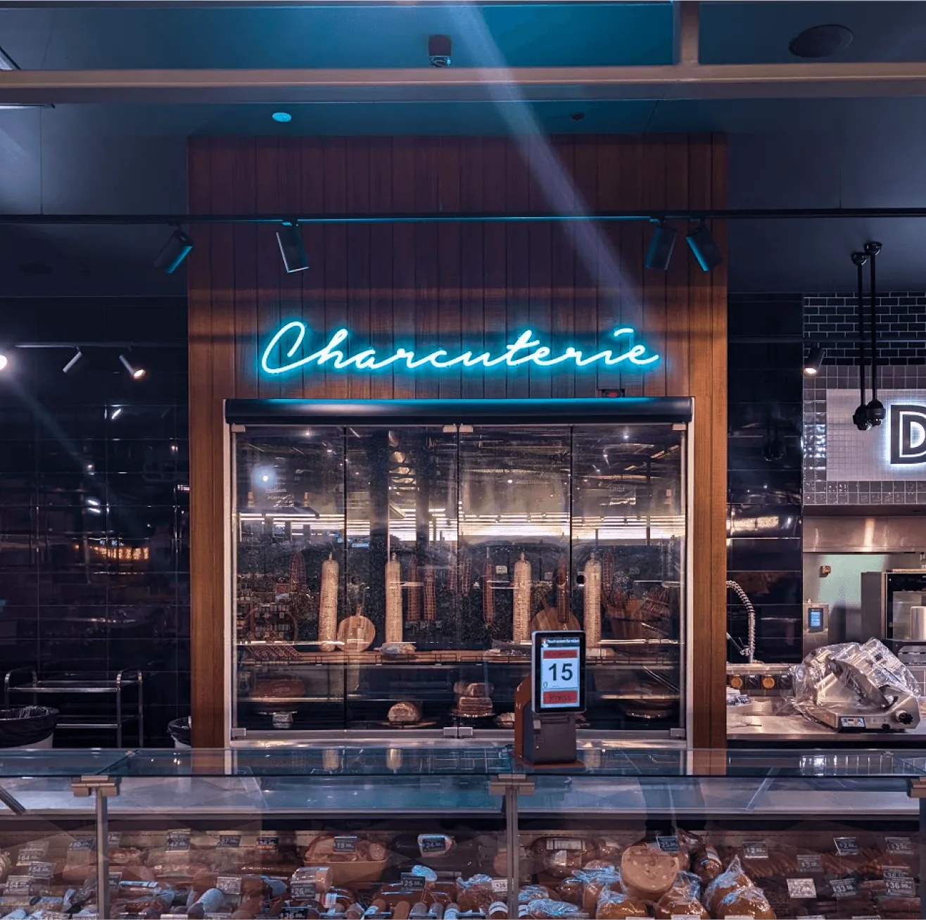 Restaurant exterior featuring blue neon illuminated signage