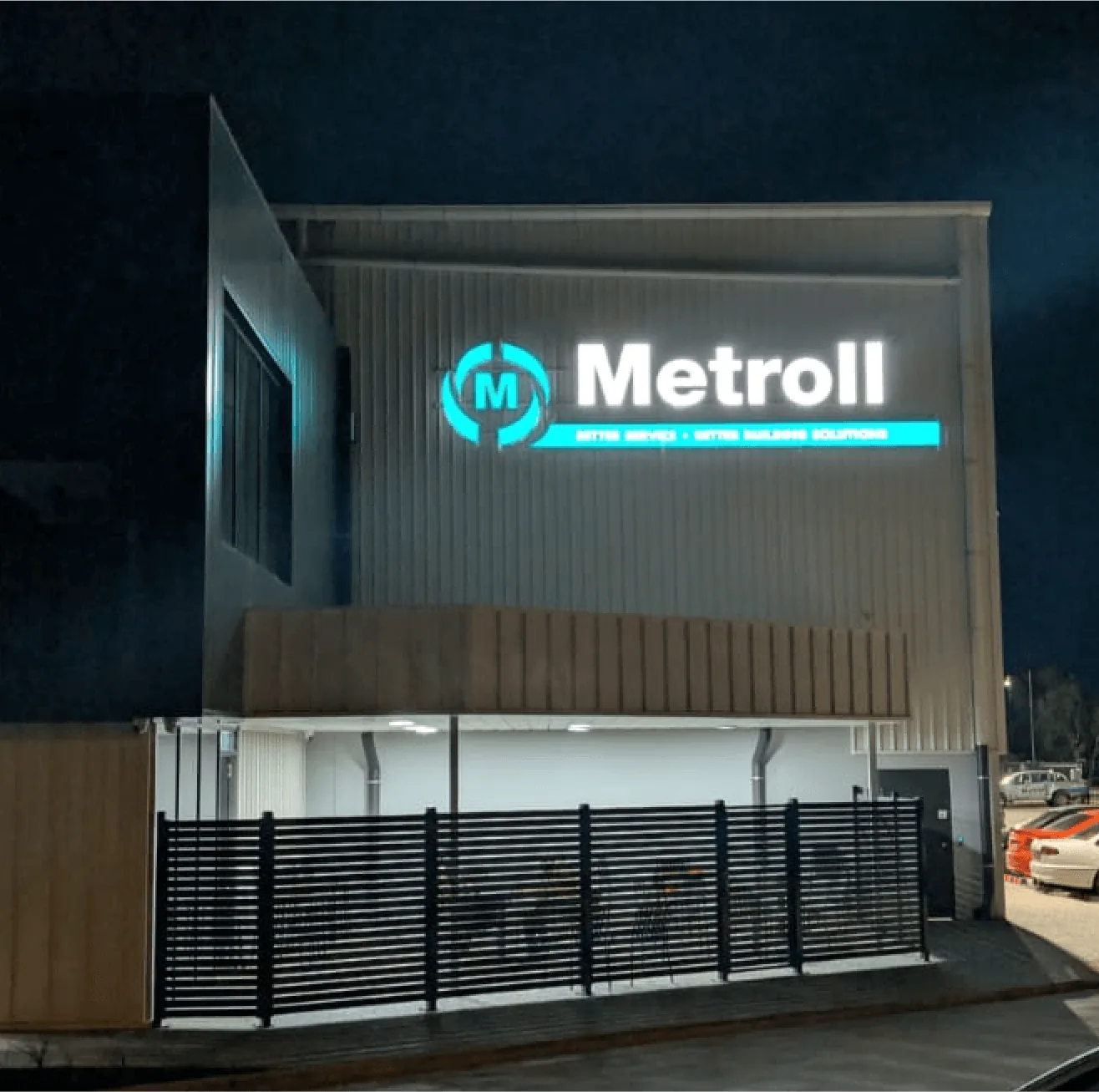 Metroll illuminated building signage installed on modern facade