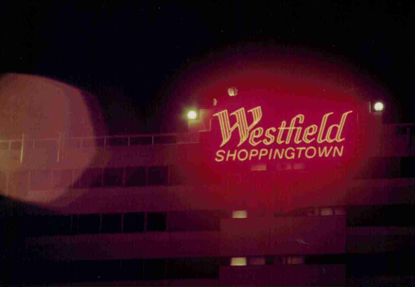 Adelaide's Westfield Shoppingtown illuminated exterior sign photographed at night