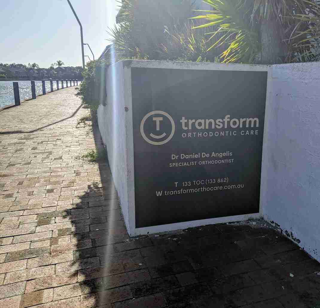Transform Orthodontic Care outdoor freestanding sign with clinic details