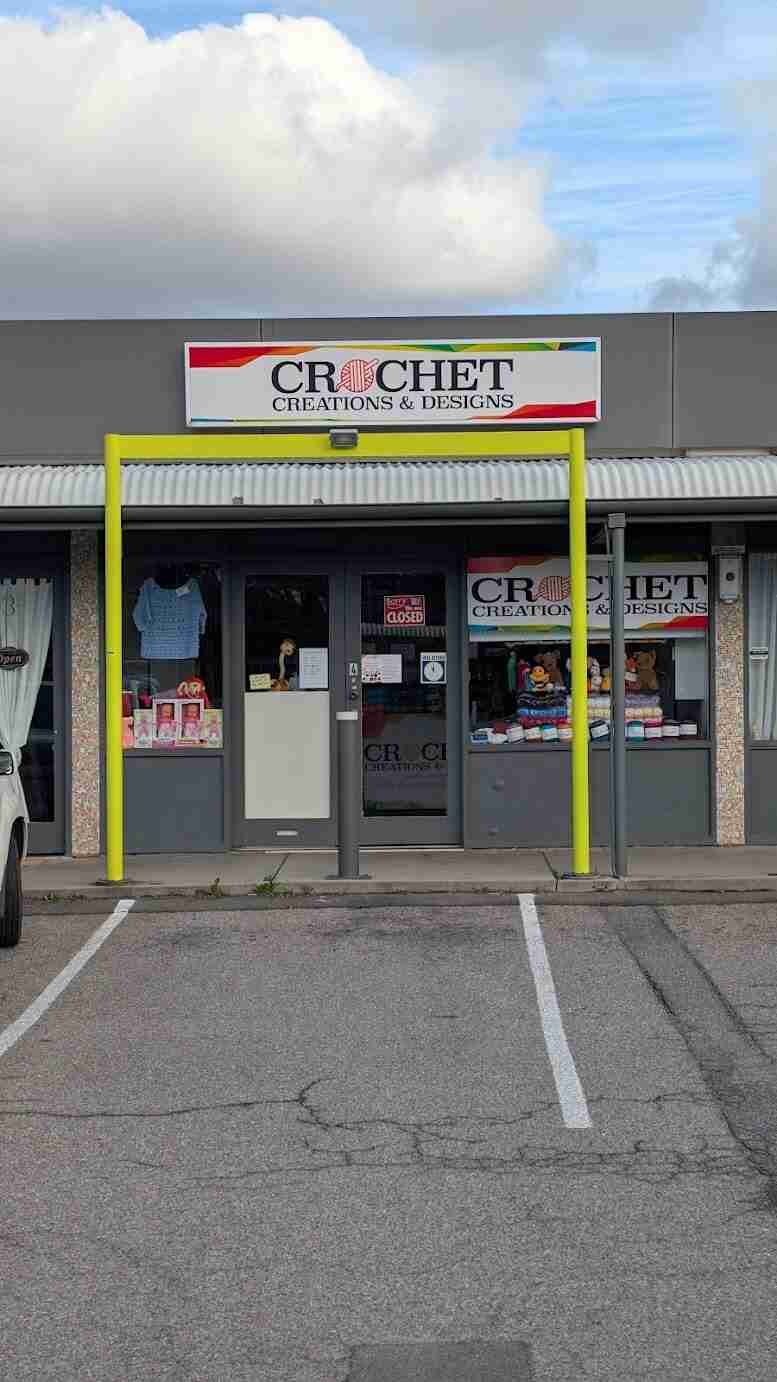 Crochet shop with colorful signage.