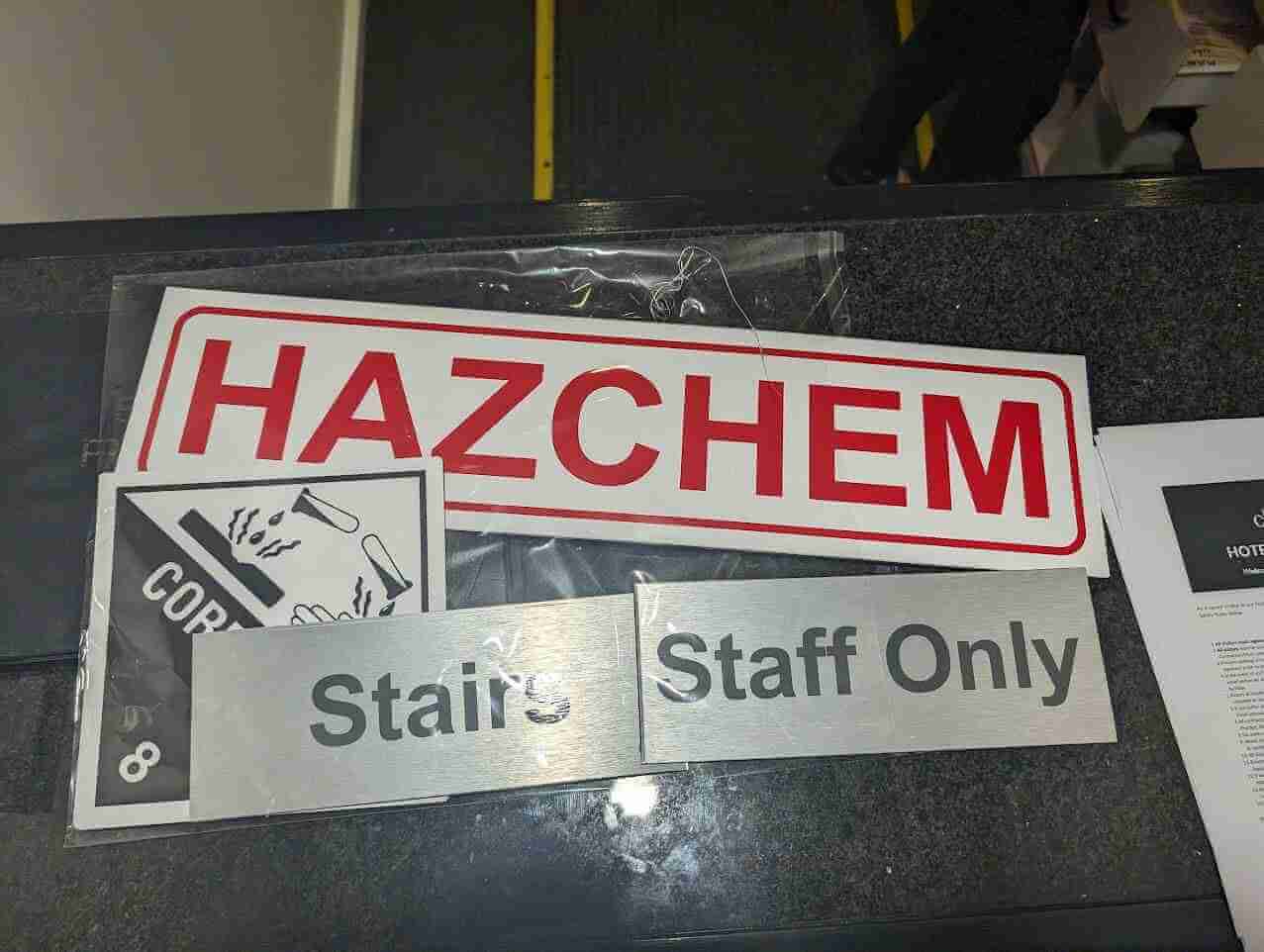 Hazchem safety sign with additional Staff Only and Stair warnings