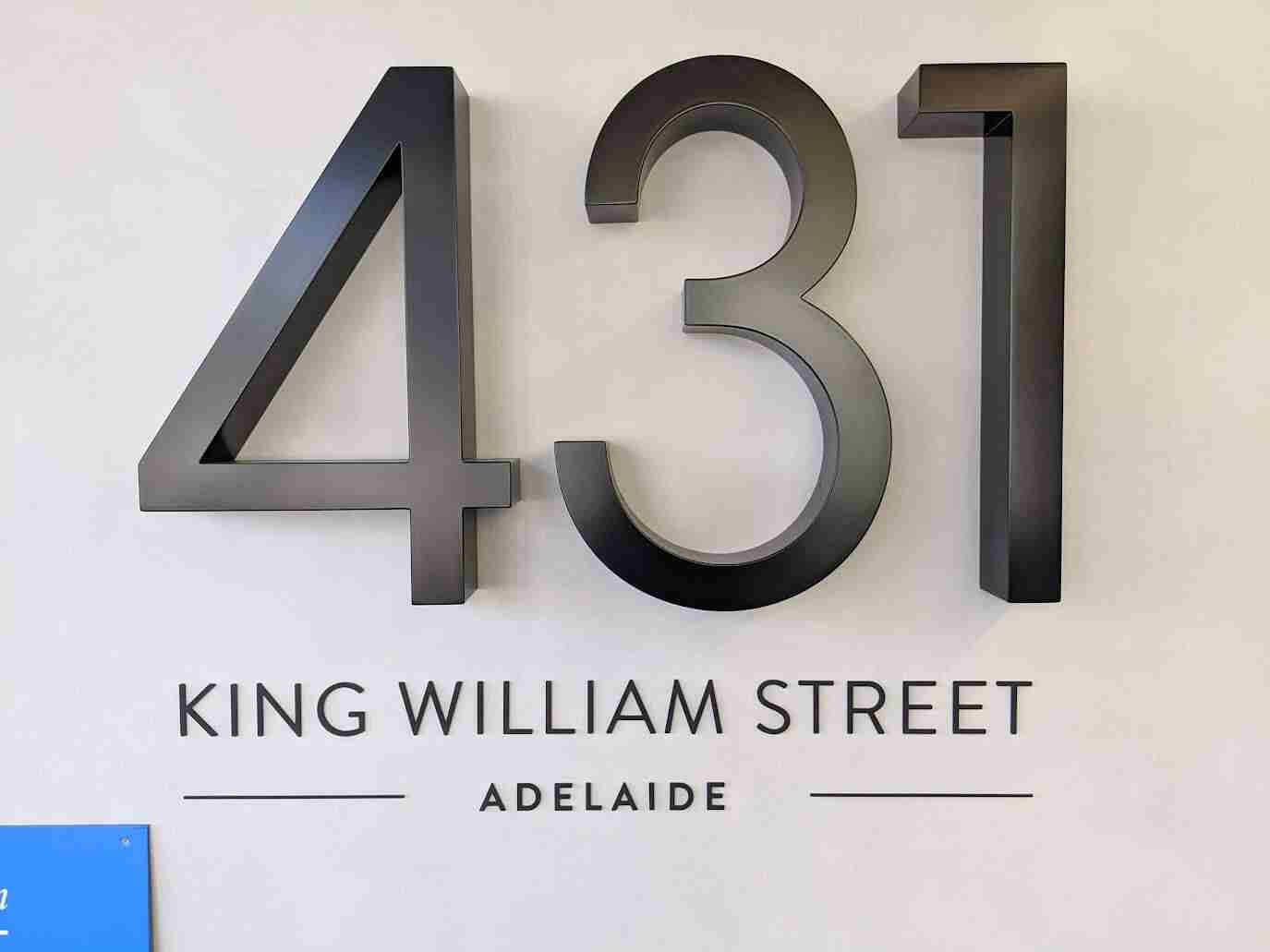 3D raised lettering for 431 King William Street installed in building lobby
