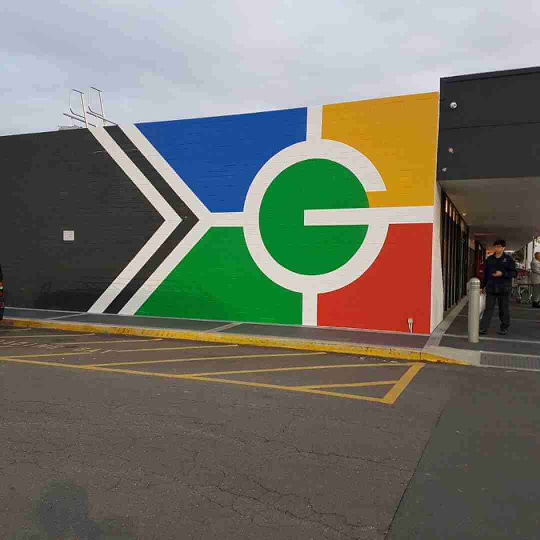 Colorful mural on building exterior.