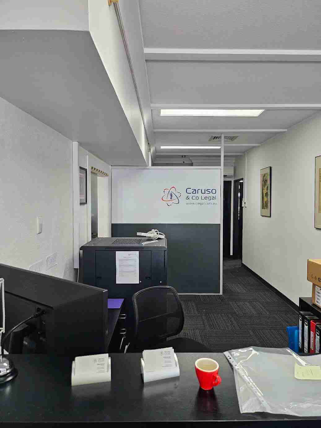 Frosted glass entry signage with logo and business details